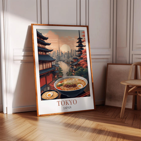 Framed poster of Tokyo with a bowl of ramen and traditional Japanese architecture.