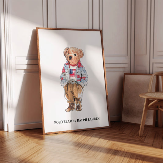 Framed artwork of a teddy bear in a room with wooden floor and chair.