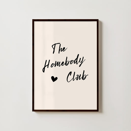 Framed print with 'The Homebody Club' text on a plain background