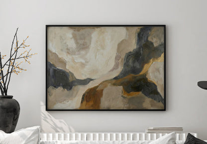 Abstract painting on a wall above a bed in a bedroom setting