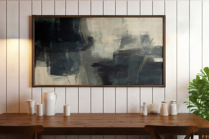 Abstract painting on a wall above a wooden table with decorative vases.